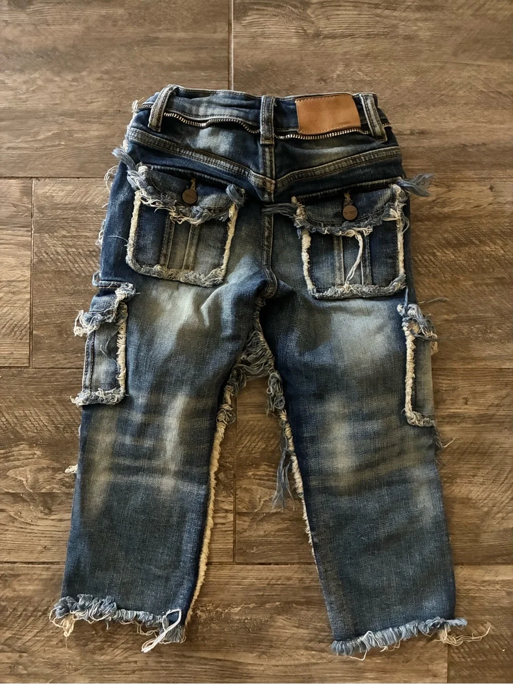 Distressed Dark Blue Denim Cargo Shorts with Frayed Trim